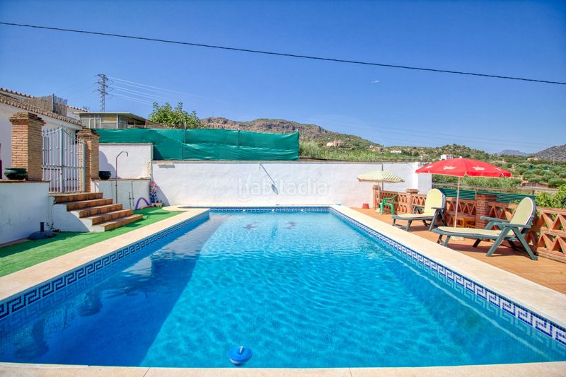 Foto e6b98c24-24cc-42e4-bae2-e7e92eb23b49. Casa amb calefacció aparcament piscina a Álora