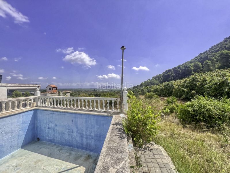Foto 0f7a2b24-ec76-4640-a594-fab4e5f084fc. Casa amb calefacció piscina a Llaurí