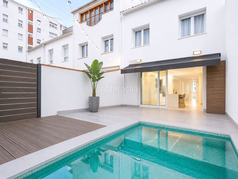 Foto 441fad8c-dab2-483e-92f8-15f060bea5a0. Casa aparellada amb calefacció aparcament piscina a Sabadell