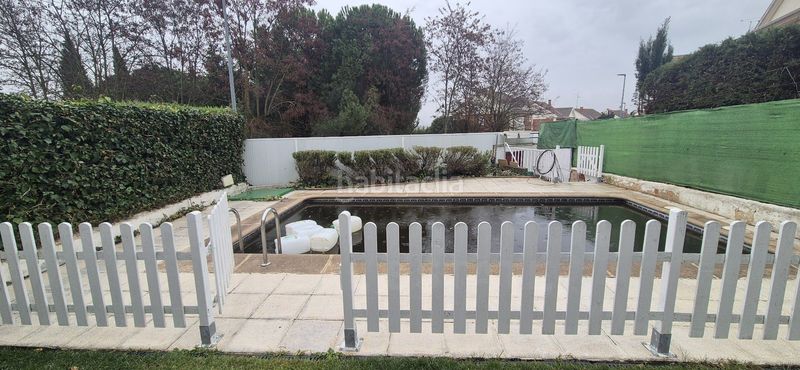 Foto 0fd9d2a0-a854-4517-9bdf-b2050bc251dd. Casa aparellada amb calefacció aparcament piscina a Cabrerizos