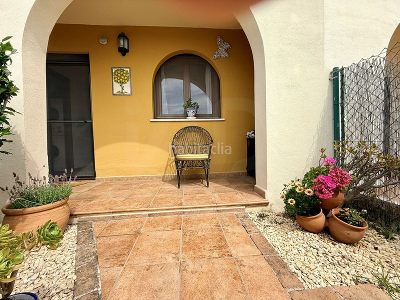 Foto 1a7ead4b-e6c3-4b7e-999b-ce38b5636b92. Casa aparellada amb calefacció piscina a Costa Esuri Ayamonte