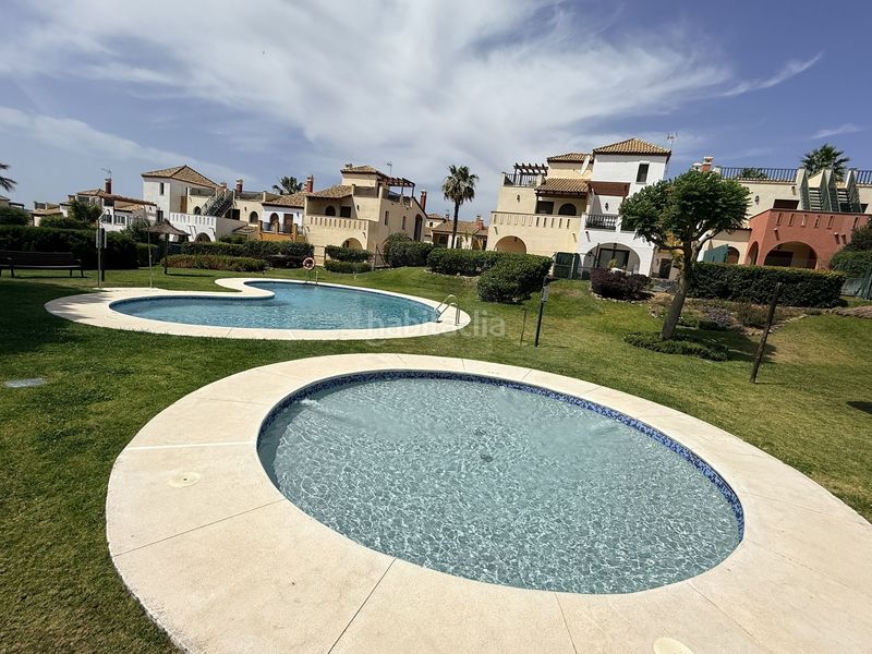 Foto 72cd7b15-1bde-4276-b2fb-fa882e4a953c. Casa aparellada amb calefacció piscina a Costa Esuri Ayamonte