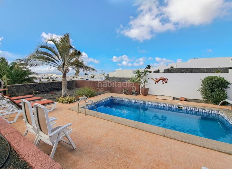 Foto 20bd64fc-eb8d-4819-954a-d0200a6dbe4b. Casa amb aparcament piscina a Playa Blanca Yaiza