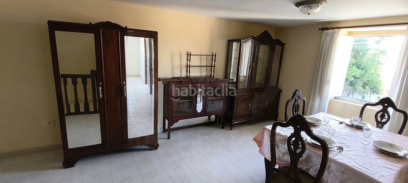 Foto 6ae871af-5419-4c72-a23f-5cbba7ef7692. Casa aparellada a Neda