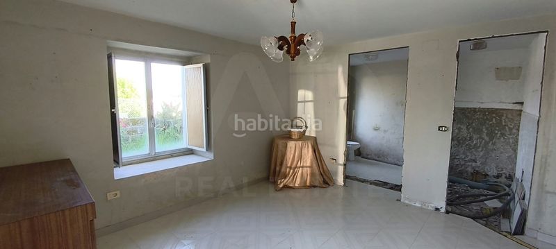 Foto b410cc33-45d0-4101-8de9-d55d468aaf9a. Casa aparellada a Neda
