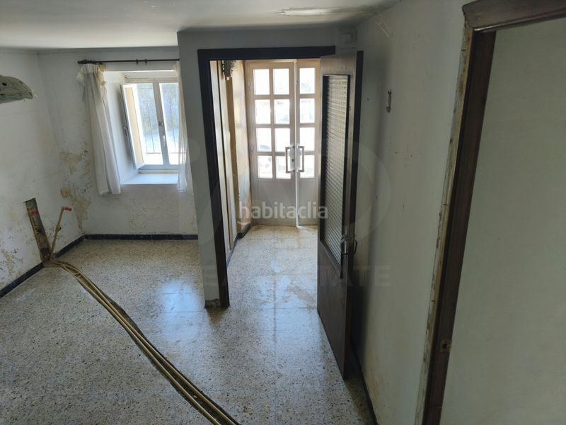 Foto c65d5b4d-d624-4470-a379-748cc04e8fd7. Casa aparellada a Neda