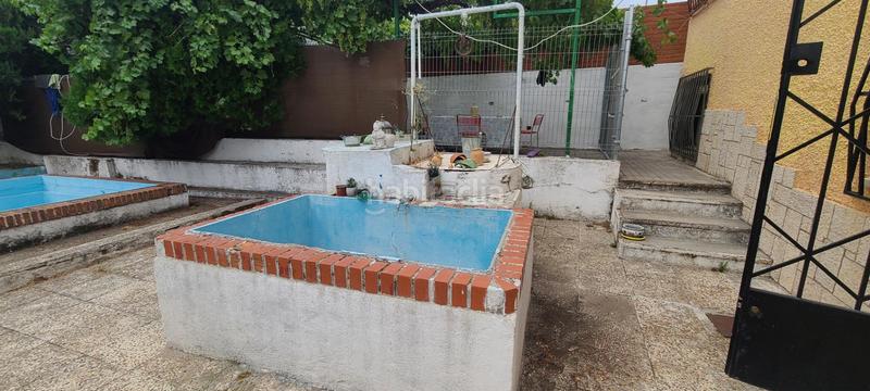 Foto 9f340e2b-b5df-4fa1-b6f9-82f126575705. Chalet con parcheggio in Centro Villaviciosa de Odón