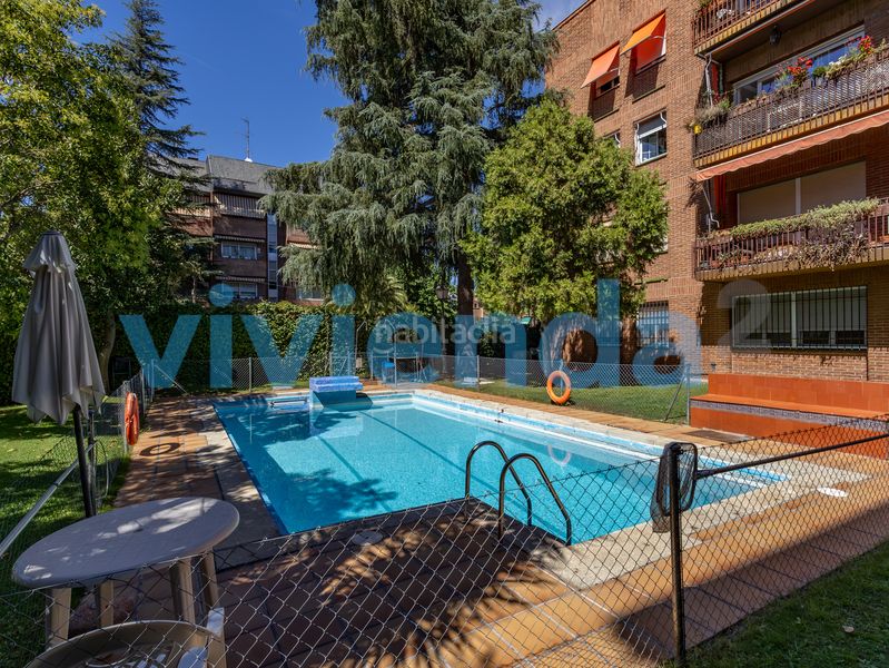 Foto 9c3a211f-b3fb-4f14-8013-2145c320d9e5. Pis amb calefacció aparcament piscina a Concepción Madrid