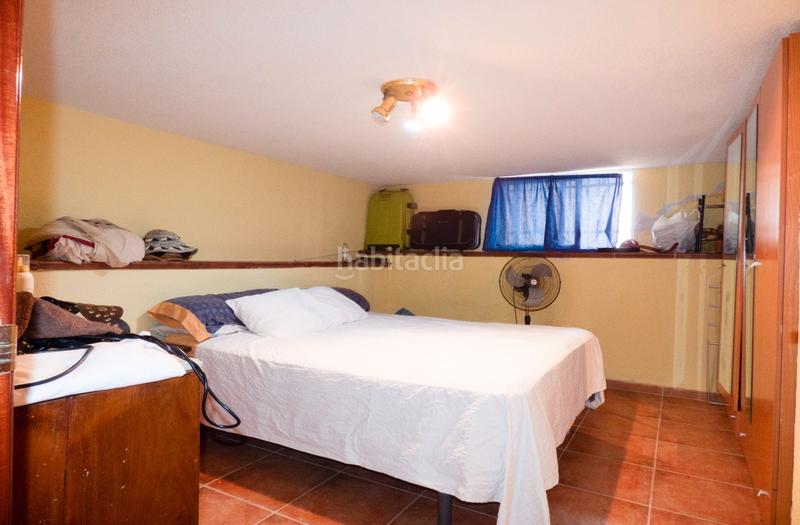 Foto 56cae25d-c399-403d-b599-a4ed7a312a41. Casa aparellada amb xemeneia aparcament a Villa del Prado