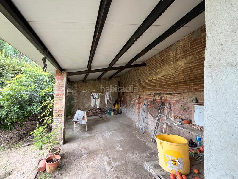 Foto 621d700f-c048-4166-b674-63f1e946f436. Casa adossada amb xemeneia aparcament a Cassà de la Selva