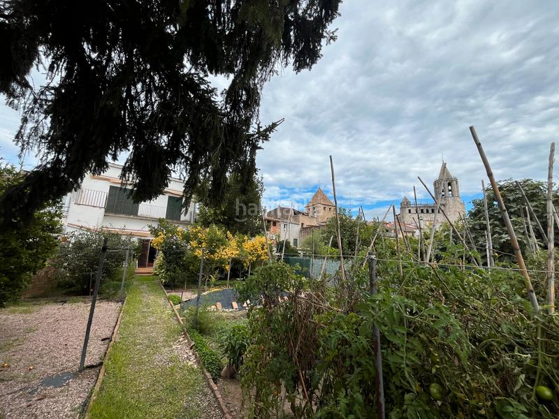 Foto 9ffc72c1-37ed-4e77-b0d1-af3797279df8. Casa adossada amb xemeneia aparcament a Cassà de la Selva