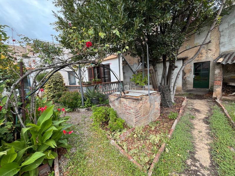 Foto b76eccde-cbc9-495b-8295-0938a5872ae6. Casa adossada amb xemeneia aparcament a Cassà de la Selva