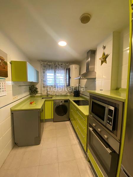 Foto 340a8b58-dc0d-4a6d-aec6-2712750ff6ec. Reihenhaus mit heizung parking in Carabaña