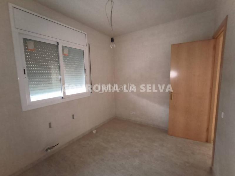 Foto 42b8207a-4459-4ba7-b8db-0914cf2fd1fe. Casa vivienda por terminar con dos espaciosos locales en Maçanet de la Selva