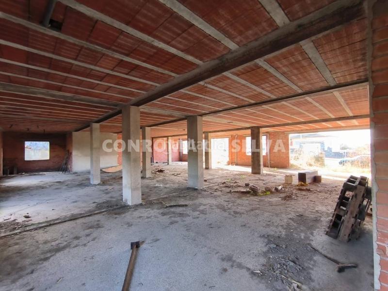 Foto 59ff55c7-b574-41e3-9bc6-ab5d22260f01. Casa vivienda por terminar con dos espaciosos locales en Maçanet de la Selva