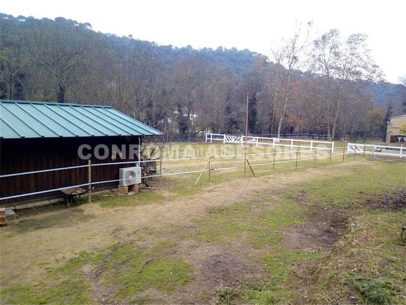 Foto b4714d0d-17fd-4699-b460-1715cc9604c3. Casale con camino riscaldamento parcheggio piscina in Fogars de la Selva