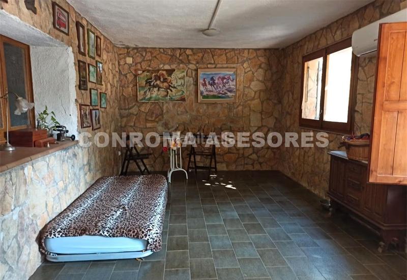 Foto 6d1928b2-106a-4fb6-a0f9-32f8ca4cf675. Masia amb xemeneia calefacció aparcament piscina a Fogars de la Selva