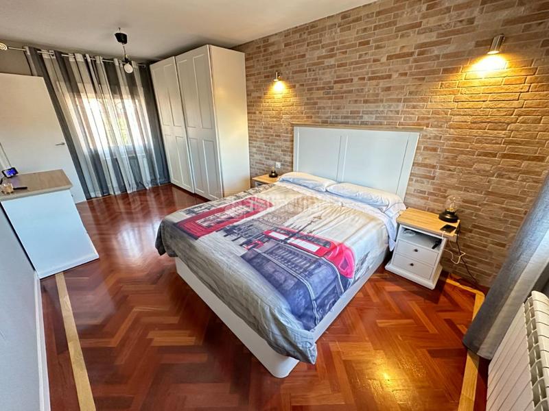 Foto 408327bc-1315-4e05-961f-ee7d8427b0df. Casa aparellada amb calefacció aparcament a Pozo de Guadalajara