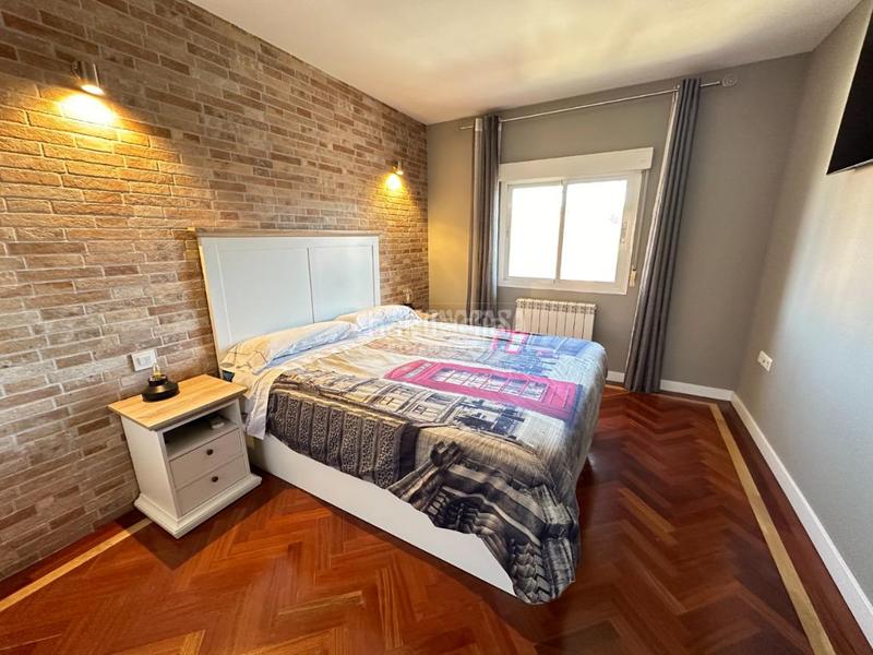 Foto c193a5a8-dc79-40ab-906b-1948b829401c. Casa aparellada amb calefacció aparcament a Pozo de Guadalajara