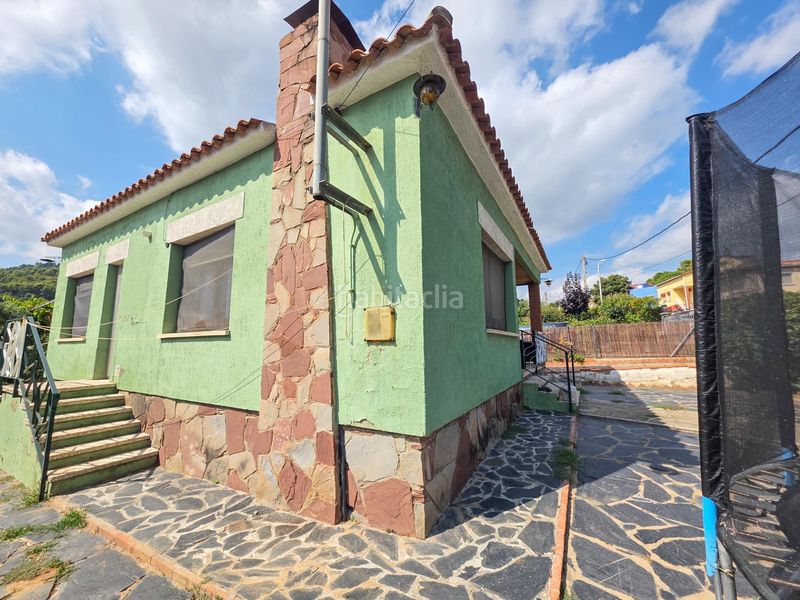 Foto fd344305-f310-4f82-8876-5b2aca93726f. Casa amb aparcament a Cànoves i Samalús
