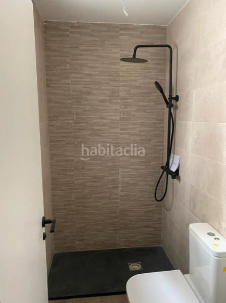 Foto 1c16520c-6257-4ea5-9dd2-c11c20baef98. Casa adossada amb calefacció aparcament piscina a Fuenlabrada