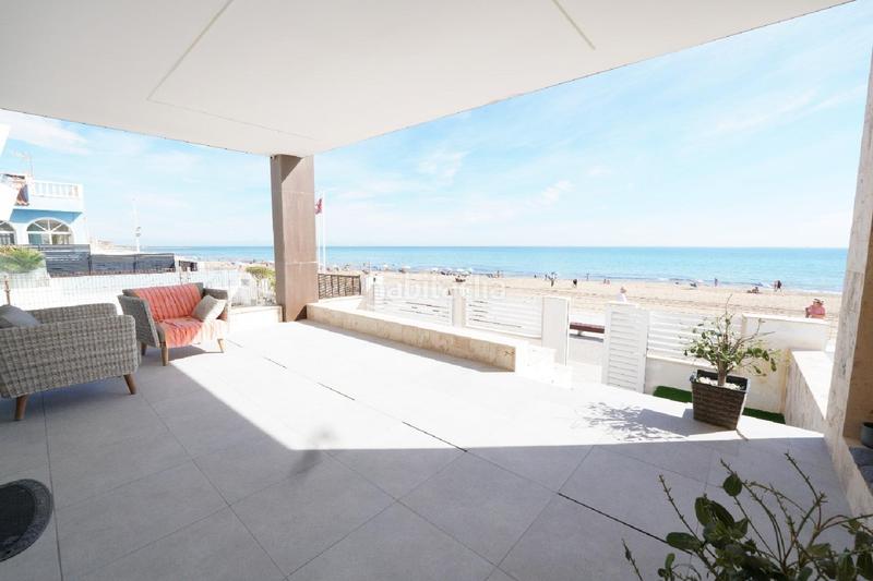 Foto 87b00cf4-49c3-4f1c-b495-ec2f73edffb5. Chalet  nuevo primera linea playa la mata en Torrevieja