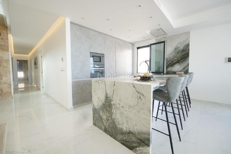 Foto 94cefb9b-b5a4-4aab-9371-e07431a2e2ea. Chalet  nuevo primera linea playa la mata en Torrevieja