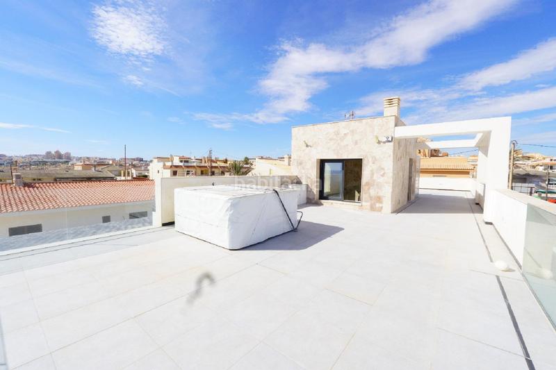 Foto e5b90e8a-78bd-459b-950f-ded8e92753dd. Chalet  nuevo primera linea playa la mata en Torrevieja