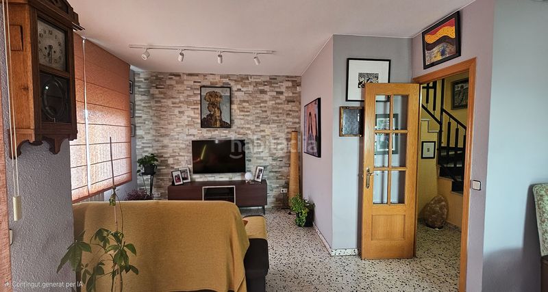 Foto 496f6ac5-f77f-470b-8bce-0f3a7e554ab3. Casa adossada amb xemeneia calefacció aparcament a Hostalric