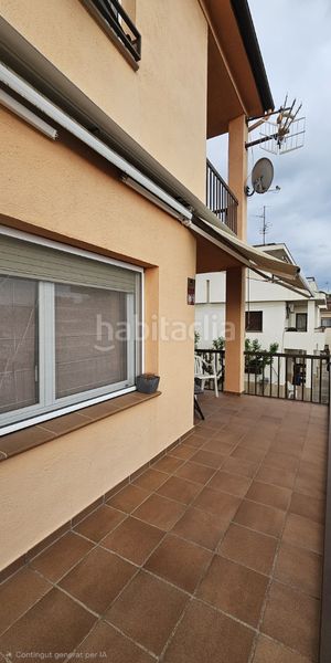 Foto ea51c2c0-1fd9-4570-8055-e64f84e0b283. Casa adossada amb xemeneia calefacció aparcament a Hostalric