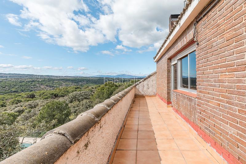 Foto 2b02c6f9-5f08-4555-ab8c-d300769e0985. Country house with fireplace heating parking pool in Torrelodones
