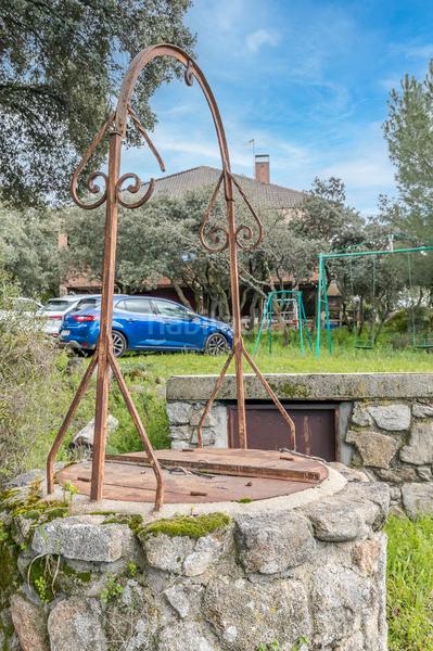 Foto 8ecfade3-e96f-414c-862e-6b05202691b3. Country house with fireplace heating parking pool in Torrelodones