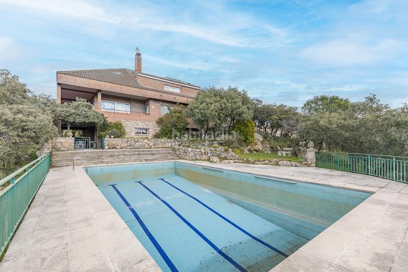 Foto c8607b00-ad35-4e46-85ae-64fa2d72c220. Country house with fireplace heating parking pool in Torrelodones