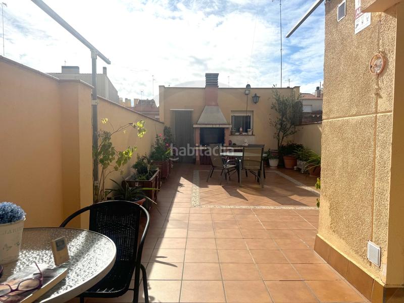 Foto 39eda5a5-bec2-40f3-af07-bc02bccfd139. Casa adossada amb xemeneia calefacció aparcament a Terrassa