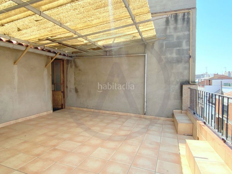 Casa  con amplio garaje, amplia buhardilla y terraza en Terrassa