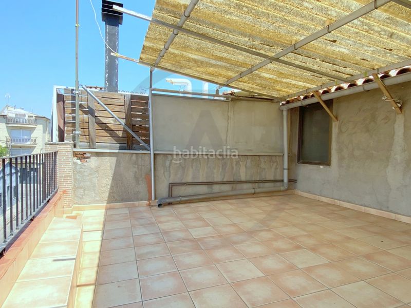 Casa  con amplio garaje, amplia buhardilla y terraza en Terrassa