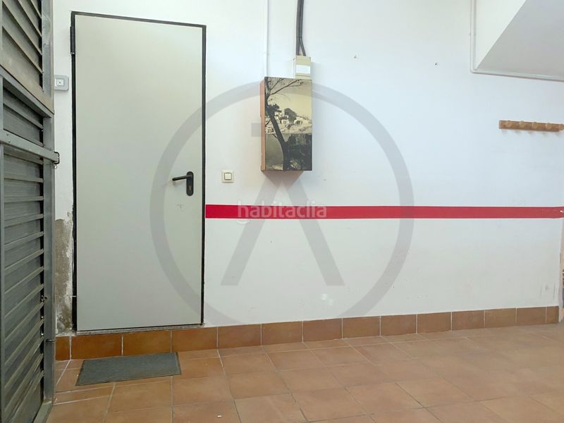 Casa  con amplio garaje, amplia buhardilla y terraza en Terrassa