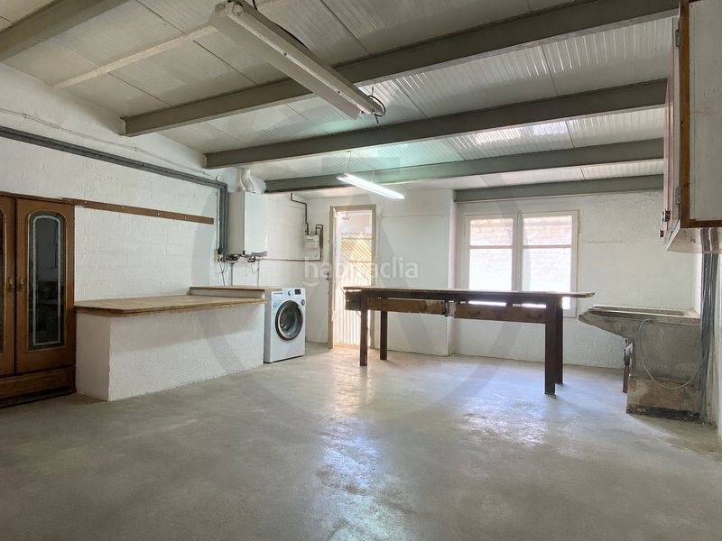 Casa  con amplio garaje, amplia buhardilla y terraza en Terrassa
