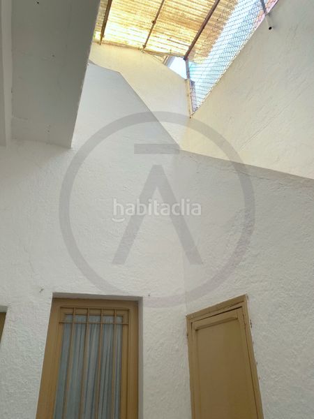 Casa  con amplio garaje, amplia buhardilla y terraza en Terrassa