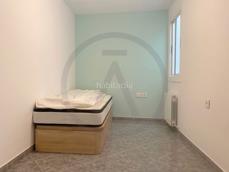 Casa  con amplio garaje, amplia buhardilla y terraza en Terrassa