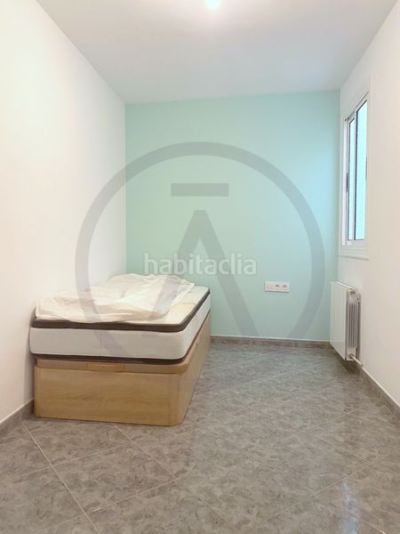 Casa  con amplio garaje, amplia buhardilla y terraza en Terrassa