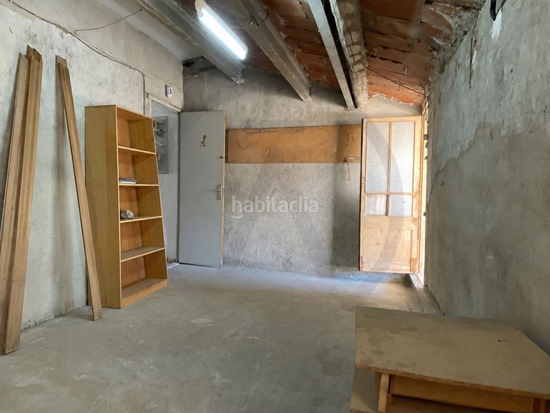 Casa  con amplio garaje, amplia buhardilla y terraza en Terrassa