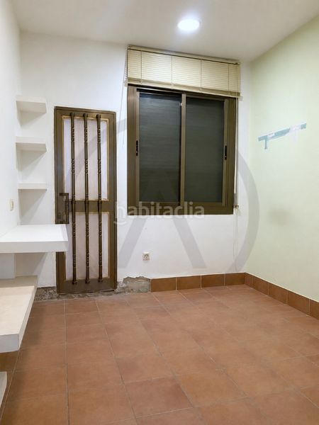 Casa  con amplio garaje, amplia buhardilla y terraza en Terrassa