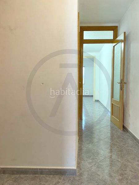 Casa  con amplio garaje, amplia buhardilla y terraza en Terrassa