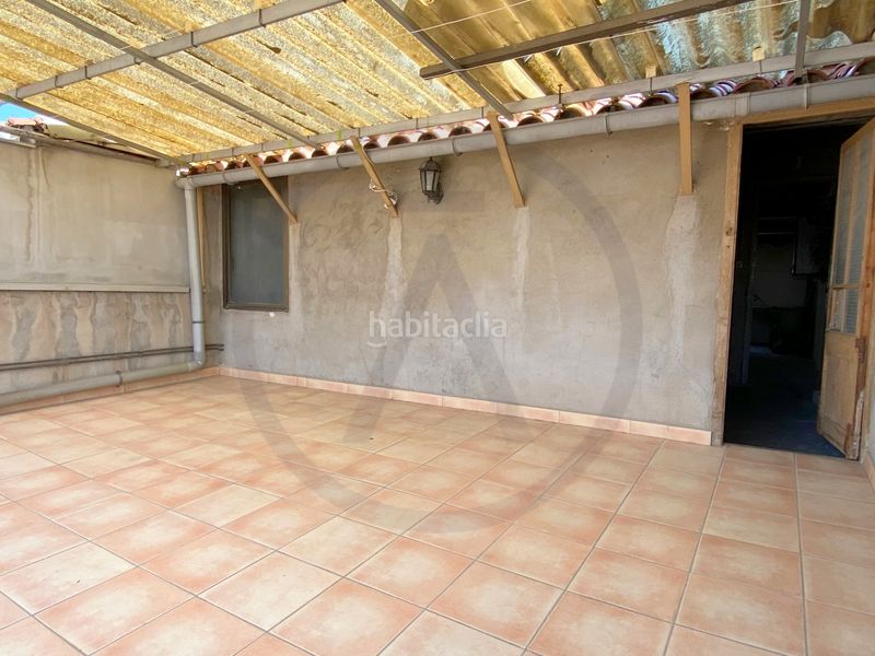 Casa  con amplio garaje, amplia buhardilla y terraza en Terrassa