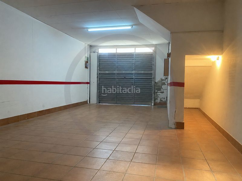 Casa  con amplio garaje, amplia buhardilla y terraza en Terrassa