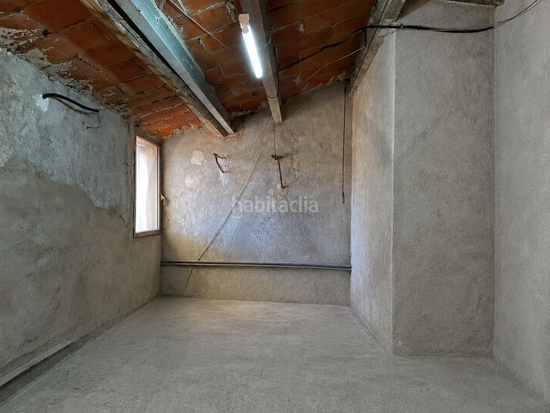 Casa  con amplio garaje, amplia buhardilla y terraza en Terrassa