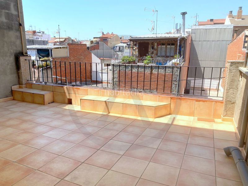 Casa  con amplio garaje, amplia buhardilla y terraza en Terrassa