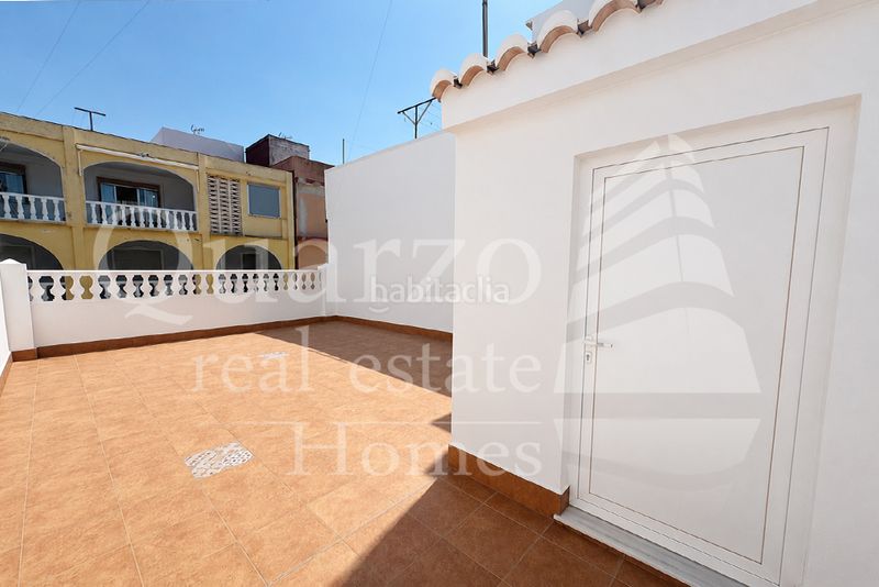 Foto 14dc7427-d009-4012-97e9-ca3bed0bb516. Casa adossada amb calefacció a El Perelló Sueca