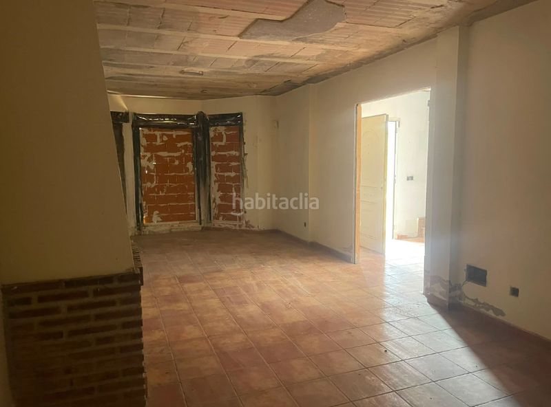Foto d805a8e1-1d03-4e2f-8ff8-7bb8cc4e3fee. Casa adossada a Méntrida